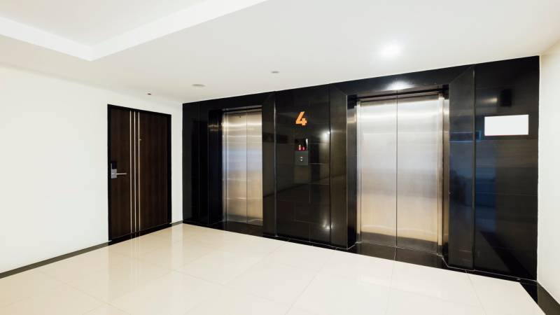 How Does Heavy Lifting Equipment Help Install Large Luxury Entry Doors?